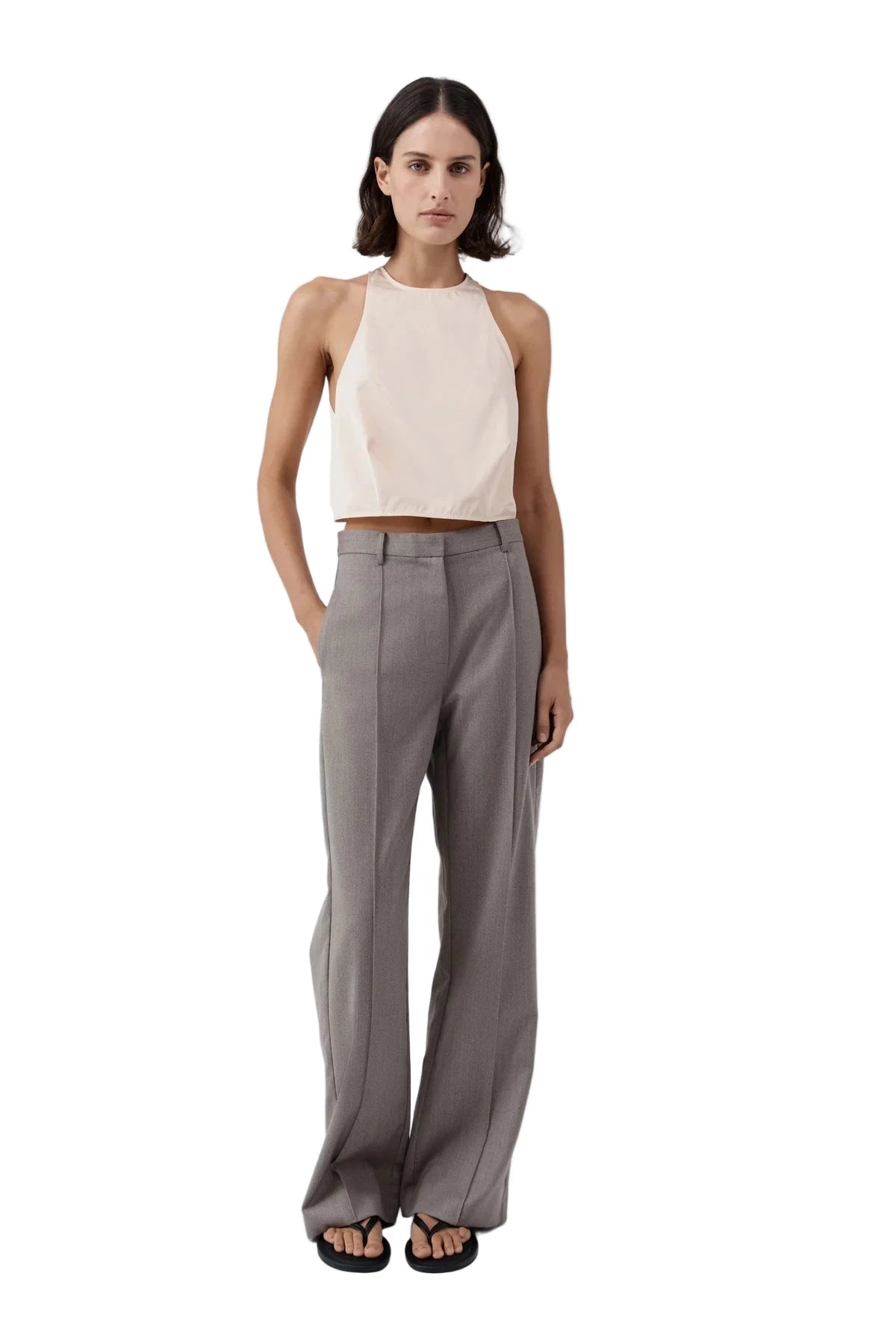 Close-up view of the fabric texture of the Oupa Pintuck Pants in Doe, highlighting the premium Wool blend material.