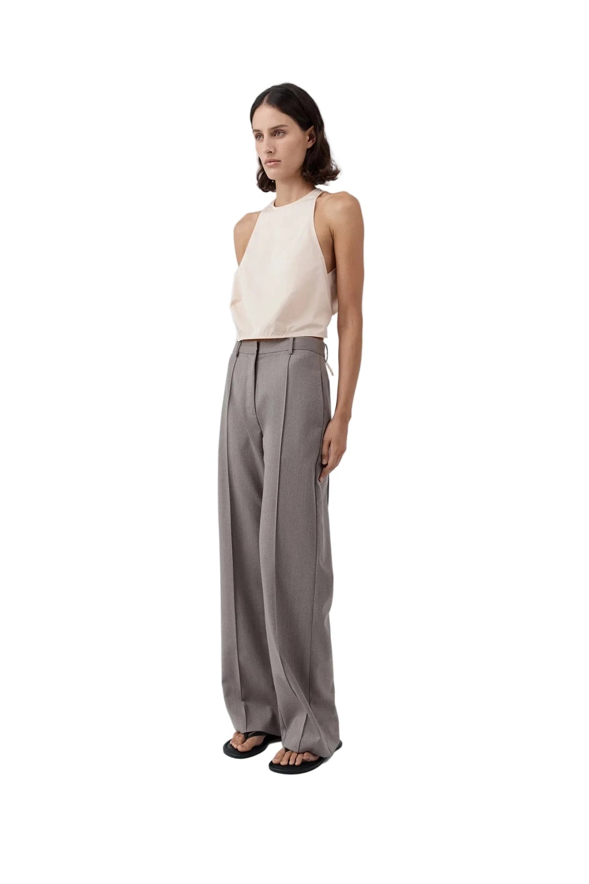Side view of the Oupa Pintuck Pants in Doe, featuring side seam pockets and refined pintuck detailing.