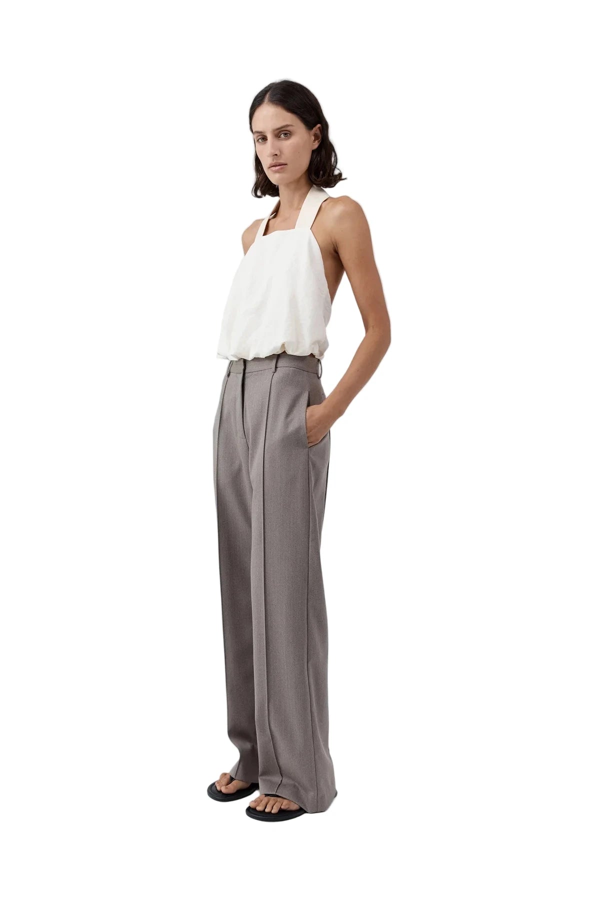 Close-up of the fabric texture of the Cloud Twist Halter Top in Off White, highlighting its soft, cloud-like silk blend.