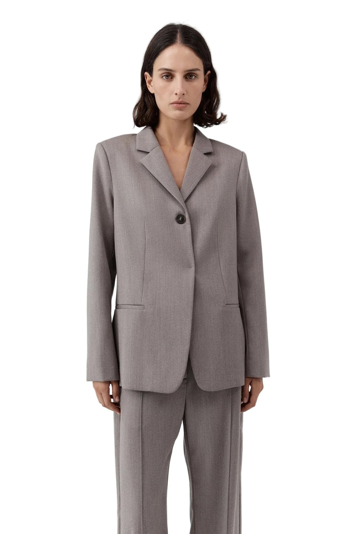 Detail shot of the higher cut single button closure on the 90s Wool Blazer in Doe.