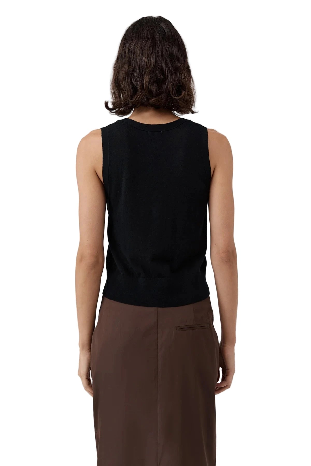 Lifestyle shot featuring the St. Agni Merino Wool Oupa Vest in Black, ideal for everyday wear and stylish layering.