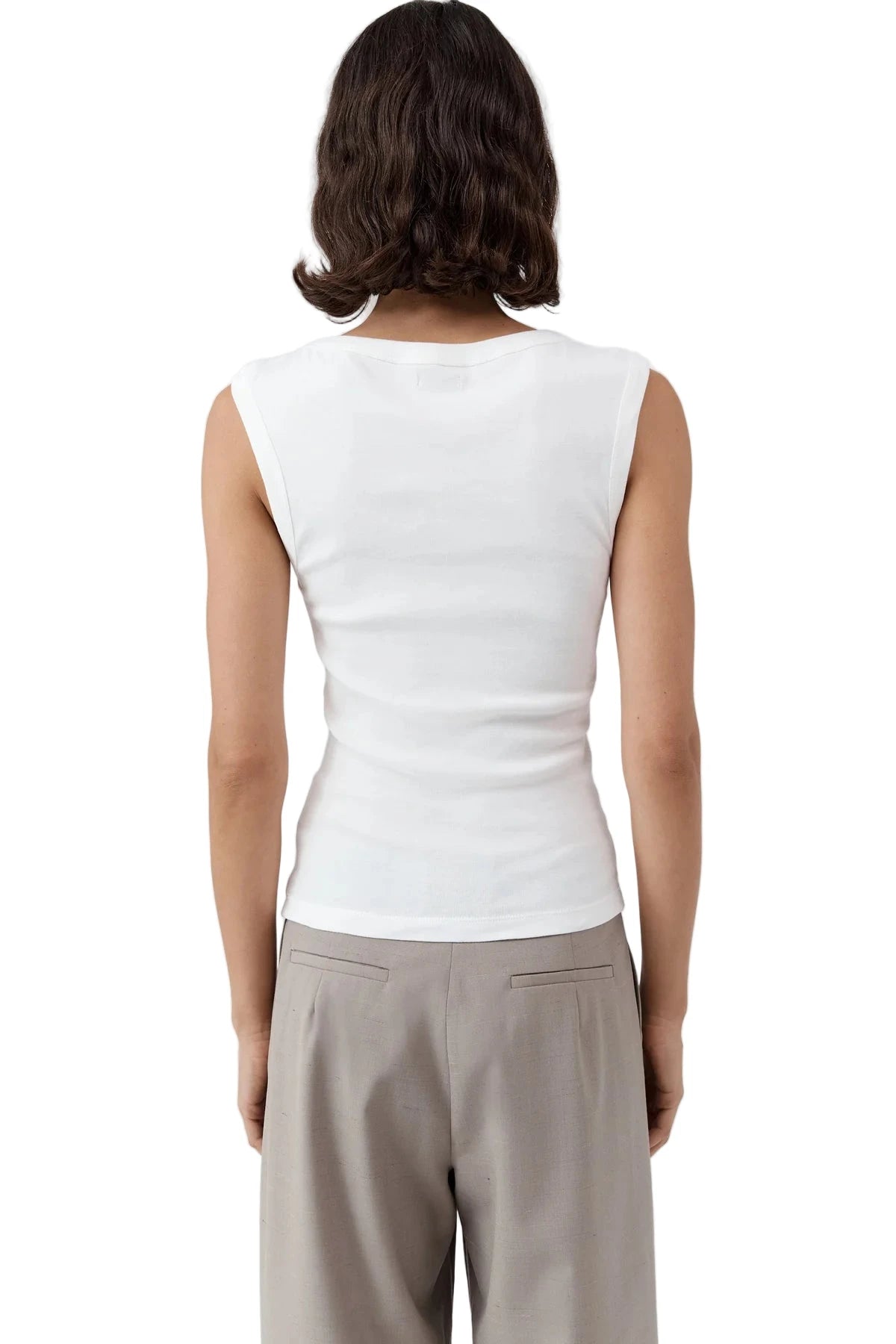 Lifestyle image featuring the St. Agni Organic Cotton 90s Top in White styled with casual attire.