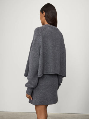 Back view of the Karine Sweater in Graphite, featuring a rolled hem and soft draping.
