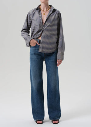 Close-up of Annina Jean in Sunland fabric featuring medium indigo wash with vintage whiskering.