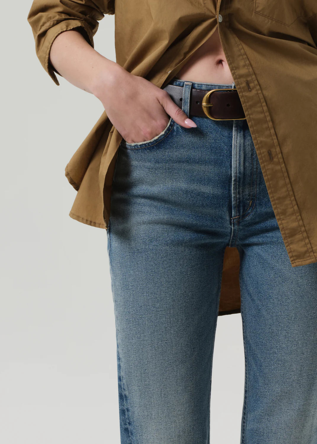 Model wearing Zurie Straight Jean in Lyon, combining classic denim style with modern comfort.