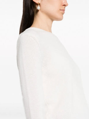 Detail shot of the Mable Sweater in Cream, showing the stitching and quality craftsmanship.