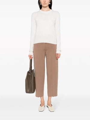 Close-up of the Mable Sweater in Cream, highlighting the ribbed trims and luxurious fabric.