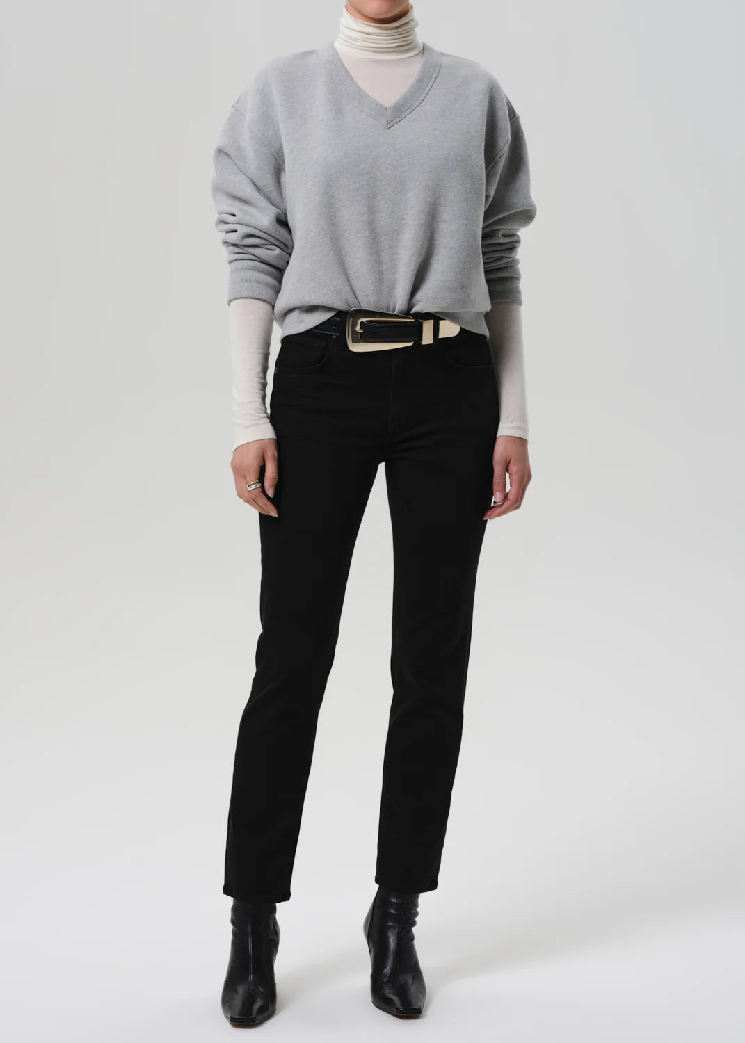 Side view of Isola Slim in Plush Black by Citizens of Humanity highlighting its mid-rise slim leg design.