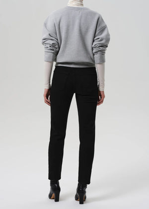Close-up detail of Citizens of Humanity Isola Slim in Plush Black fabric showing the soft stretch denim.