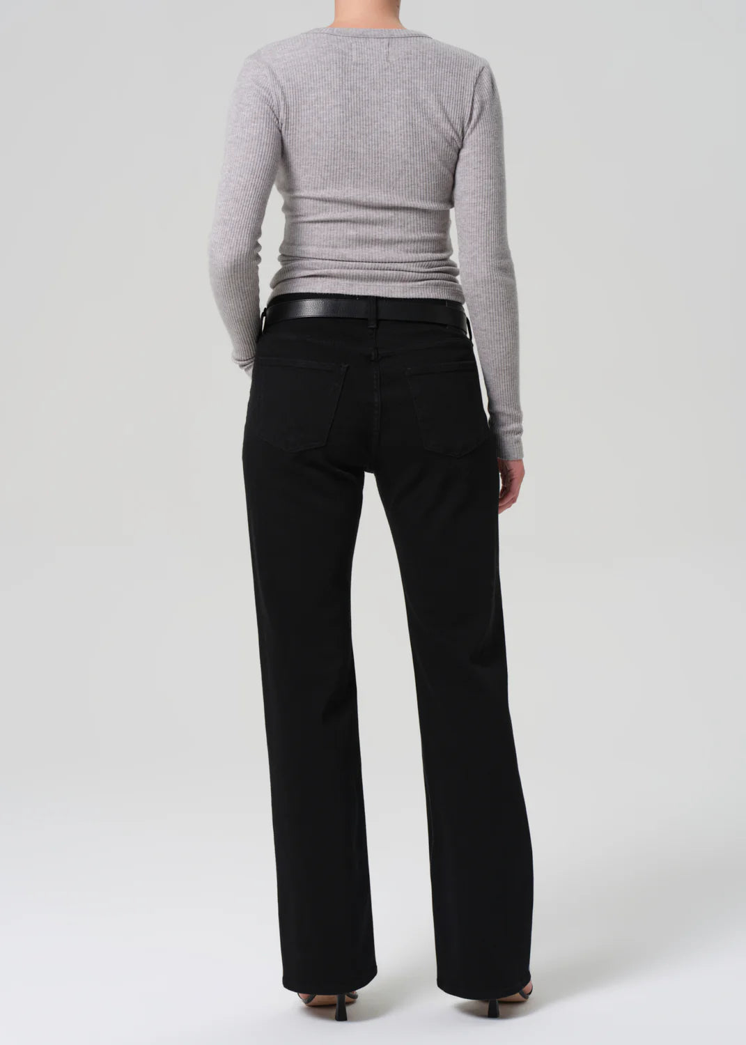 Elegant outfit featuring the Genova Low Rise Boot in Starless paired with a silky blouse.