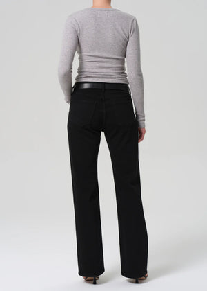 Elegant outfit featuring the Genova Low Rise Boot in Starless paired with a silky blouse.
