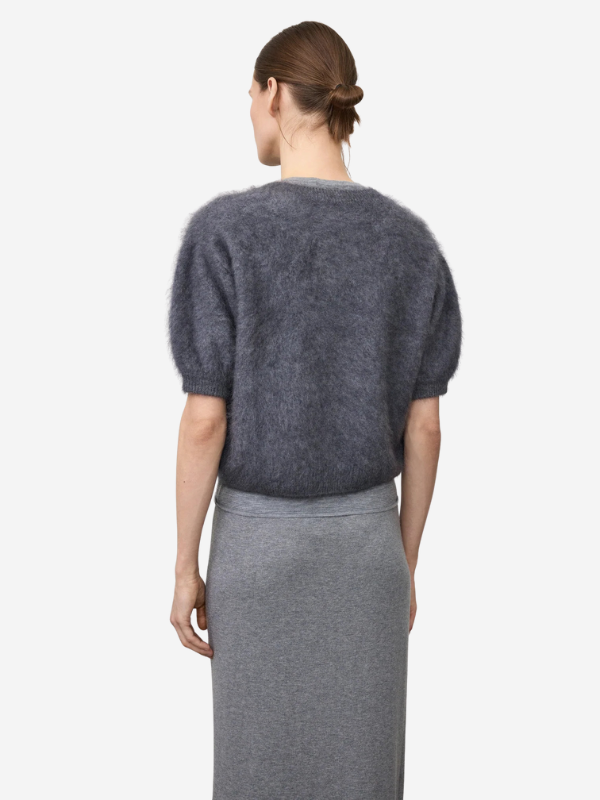 Back view of the Juniper Sweater in Graphite highlighting its stylish cropped design and dropped shoulders.