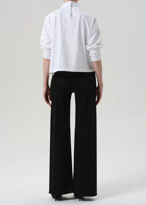 Back view of the Lyra Long Wide Leg in Plush Black demonstrating its flattering high waist and chic design.
