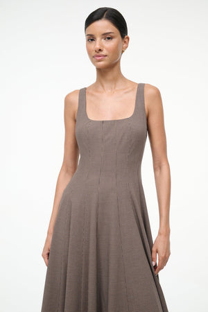 Detailed view of the Staud Wells Dress in Houndstooth, focusing on the square neckline design