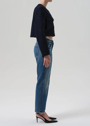 Model wearing Anissa Jeans in Alma, styled with a slouchy knit sweater for a relaxed urban look.