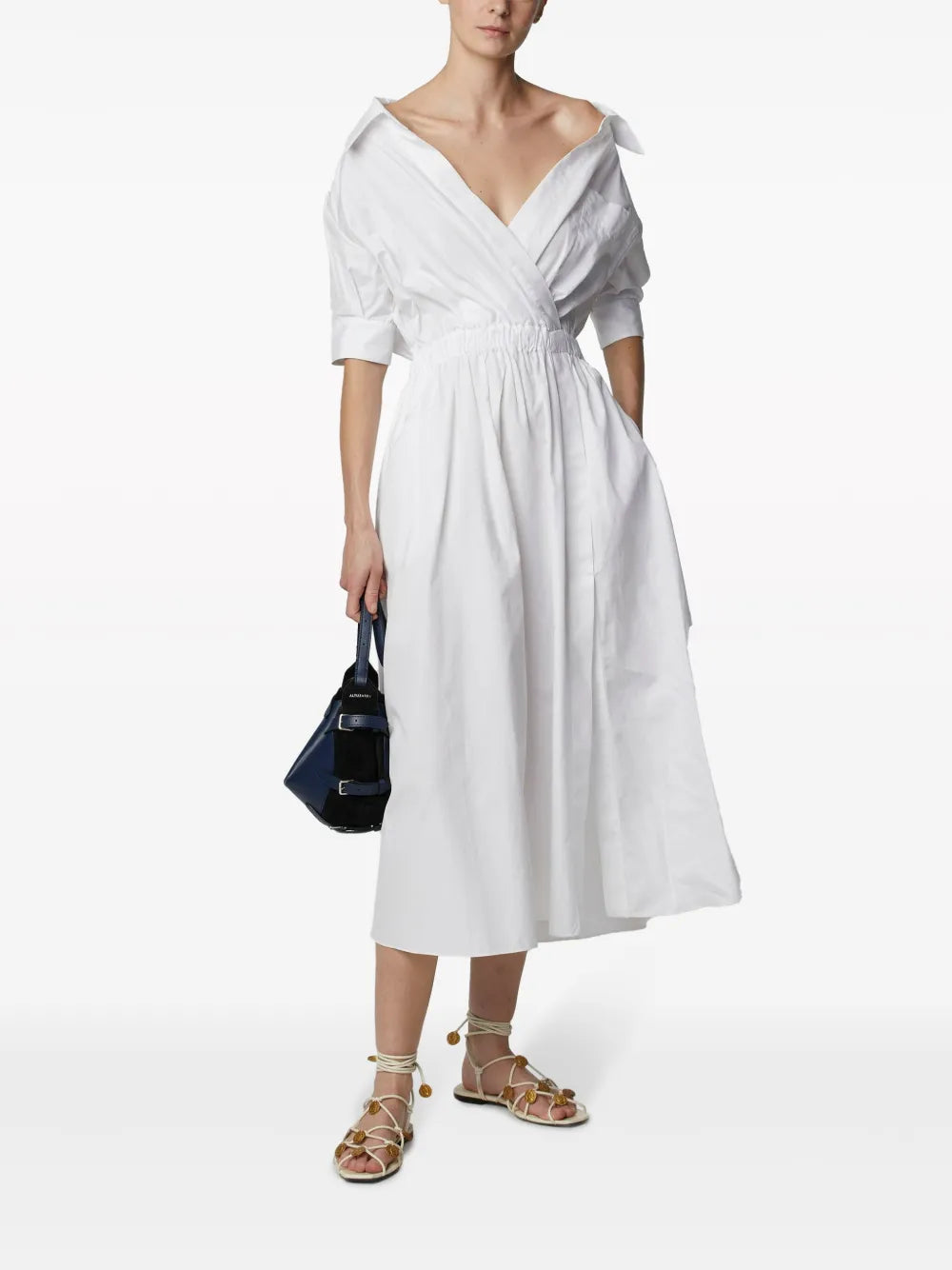 Full view of the Lydia Dress in Optic White by Altuzarra, highlighting its elasticized waist and elegant design.