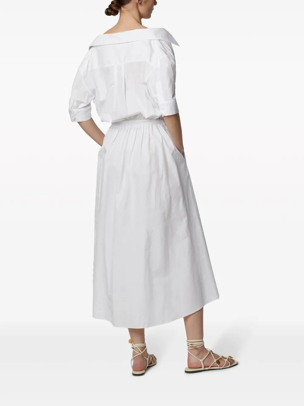 On-seam pockets of the Lydia Dress in Optic White by Altuzarra, showcasing its effortless style.