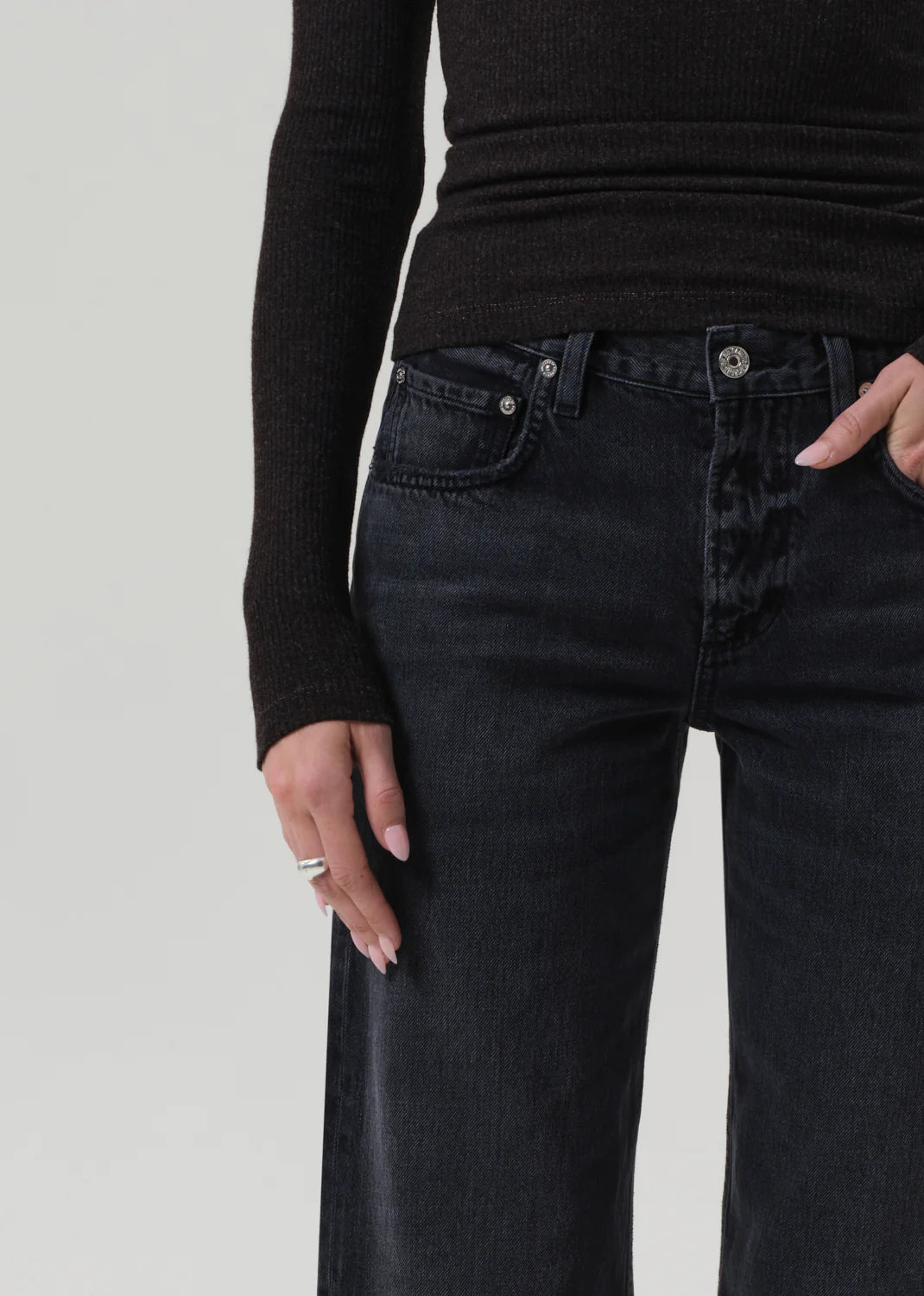 Lindz Easy Straight jeans in Vintage Black displayed on a hanger, highlighting the zip fly and clean lines.