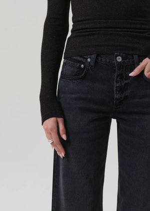 Lindz Easy Straight jeans in Vintage Black displayed on a hanger, highlighting the zip fly and clean lines.