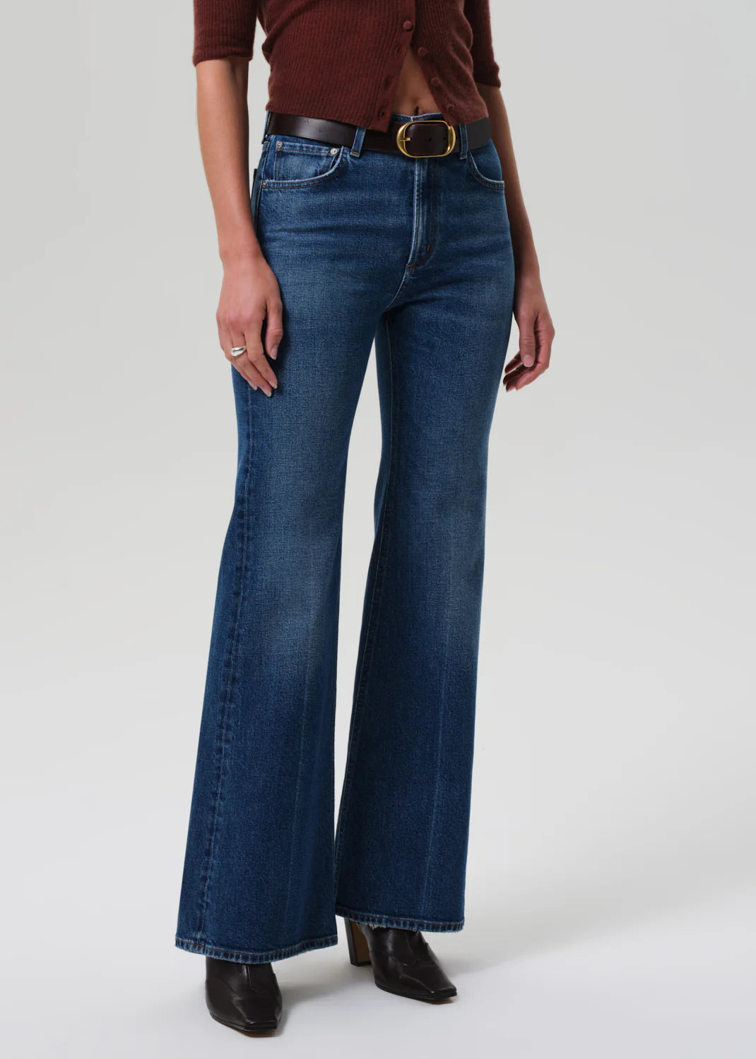 Detail shot of Kimberly 70's Flare in Cruise, focusing on the zip fly closure and comfortable fit.