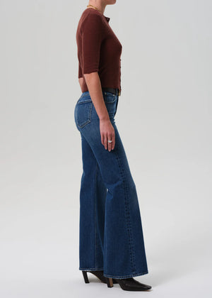 The back view of Kimberly 70's Flare in Cruise, highlighting its flattering silhouette and classic flare cut.