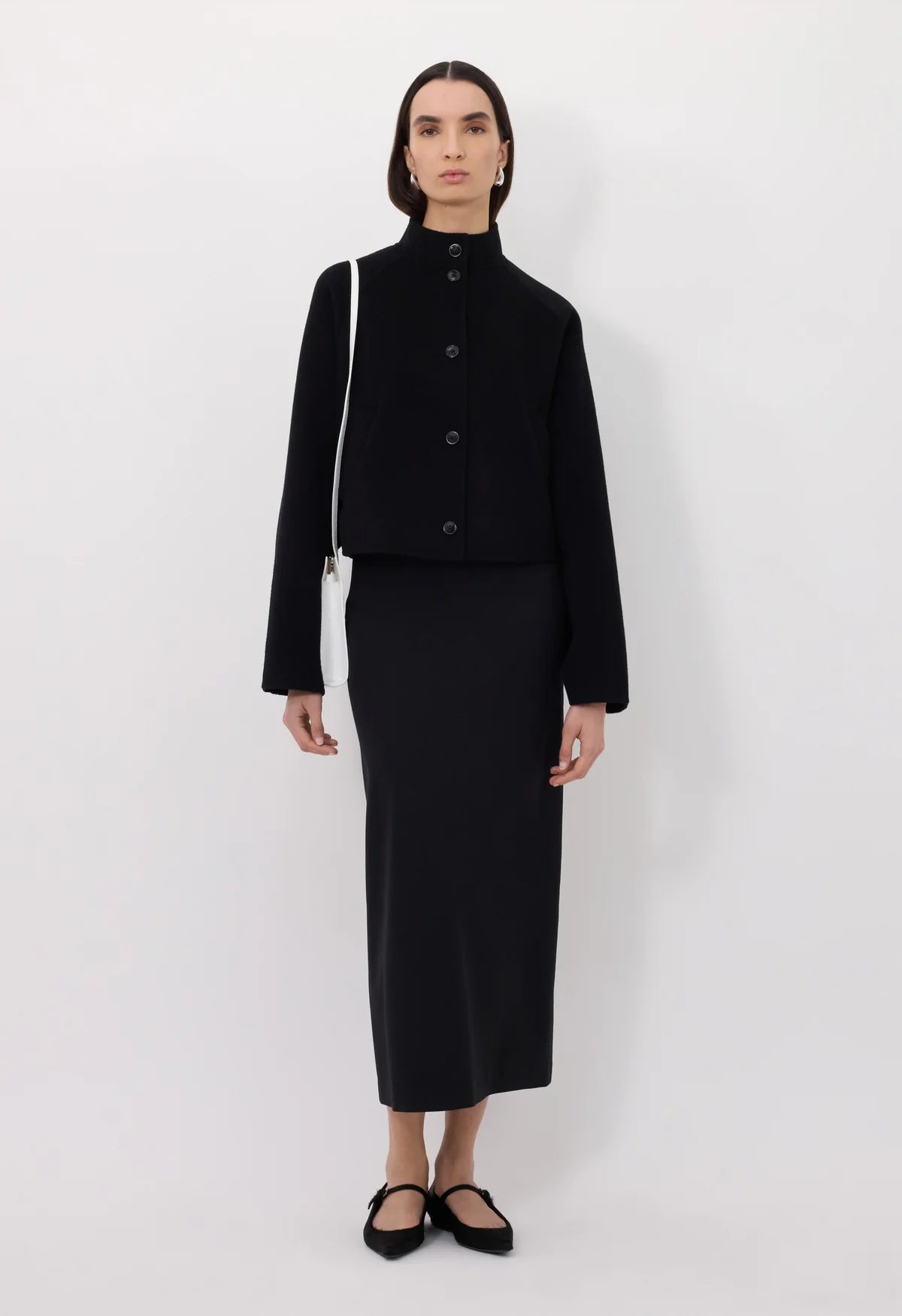 Close-up of the Nyma Jacket in Black, highlighting the luxurious wool cashmere blend fabric.