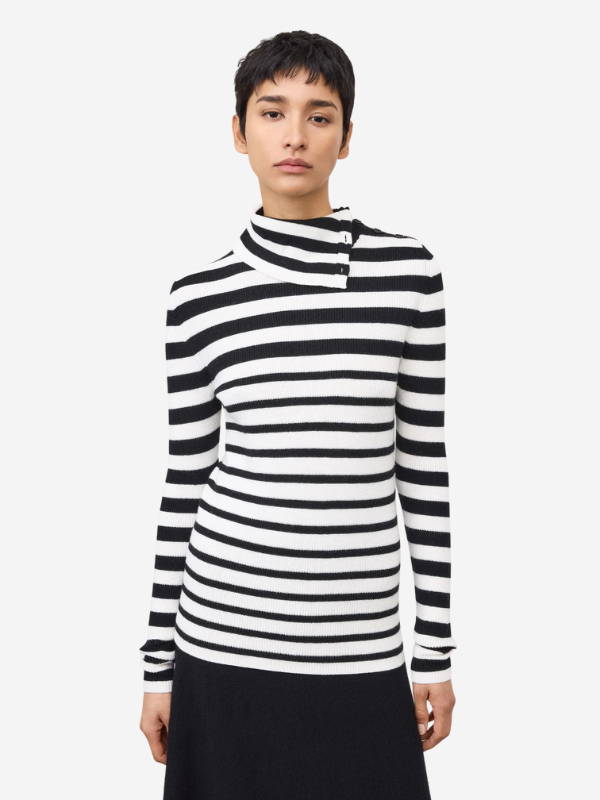 Side view of the Sabrine Sweater in Salt/Noir Stripes, highlighting the full-length sleeves and hip-length fit.