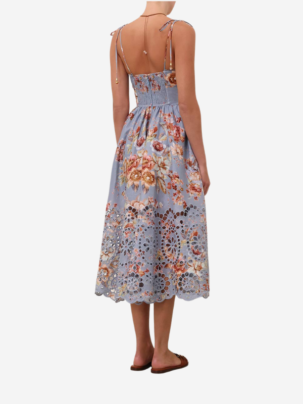 Back view of the Awaken Picnic Dress in Chambray Floral, highlighting the self-tie straps and elegant silhouette.