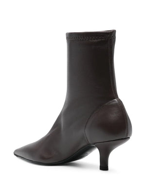 Close-up of Nappa Heeled Sock Boot in Bark showing the premium quality of the calf leather and soft sheep leather lining.
