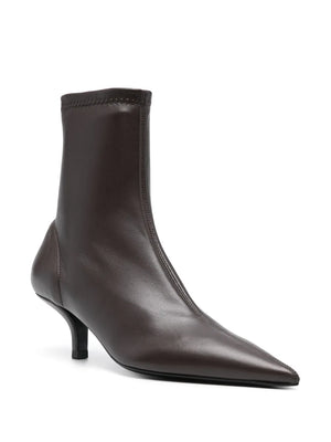 Elegant Nappa Heeled Sock Boot in Bark by TOTEME, featuring supple Nappa leather and an elongated shape perfect for evening outings.