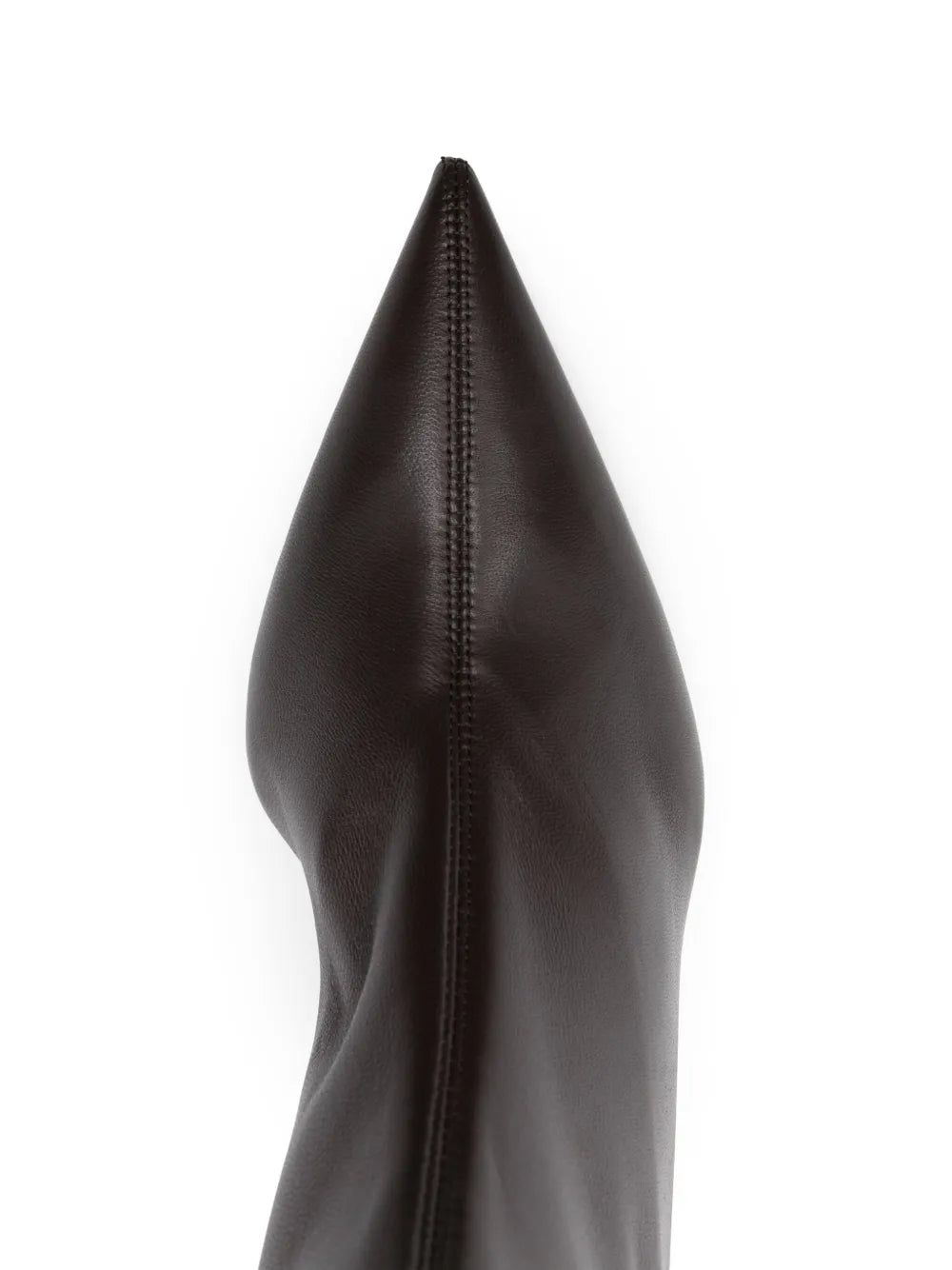 Nappa Heeled Sock Boot in Bark by TOTEME displayed in a chic setting, highlighting its modern design and versatility with jeans.