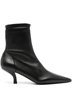 Nappa Heeled Sock Boot in Black from TOTEME showcasing its sleek elasticated design and pointed toe.