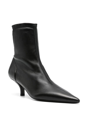 Close-up of the Nappa Heeled Sock Boot in Black, highlighting its supple Nappa leather upper and neoprene reverse.