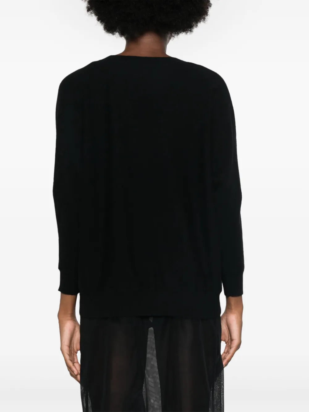 Casual outfit idea with the Kenny Sweater in Black by Lisa Yang, styled comfortably over the shoulders.