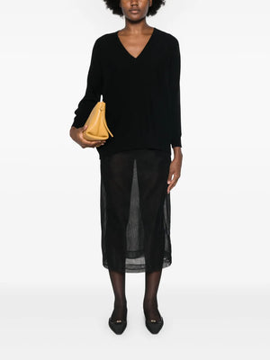Close-up of the luxurious texture of the Kenny Sweater in Black by Lisa Yang, made of fine-gauge cashmere.