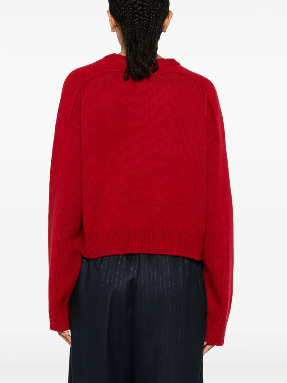 Back view of the Bruzzi LDS Crop Sweater in Red, highlighting its exquisite drop shoulder design and chic cropped silhouette by Loulou de Saison.
