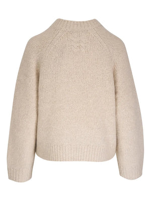 Tomaso Sweater in Beige Melange paired with stylish accessories, perfect for a chic autumn look.