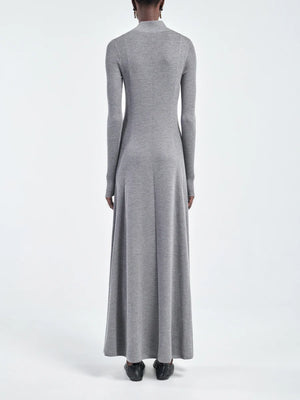 Model wearing the Rib Godet Dress in Heather Grey, illustrating the slim fit on the upper body and flowy skirt.