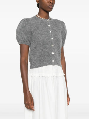 Model wearing the Anisa Cardigan in Dark Heather Grey styled with casual outfits by Dôen.