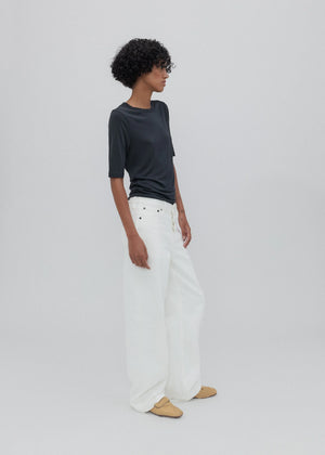 Everyday Jean in Milk featuring traditional button fly and custom hardware details.