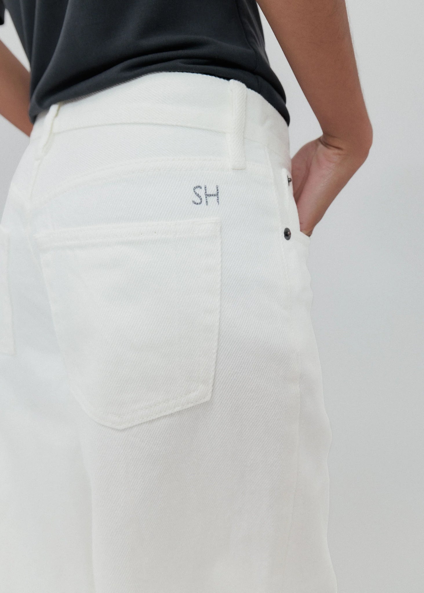 Model wearing the Everyday Jean in Milk demonstrating its versatility for day-to-night wear.