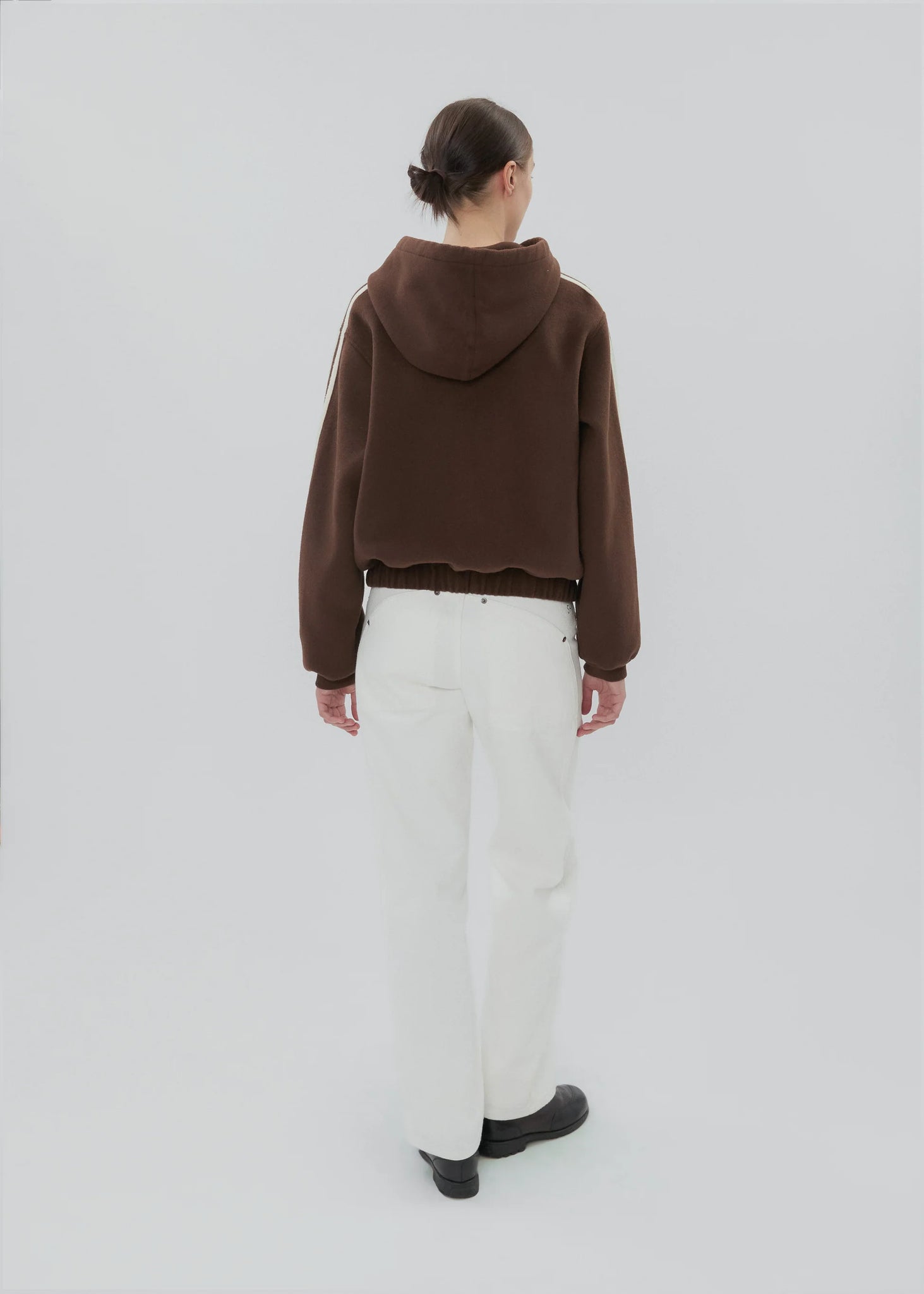Front view of Boyfriend Zip in Chocolate Brown, styled with casual outfit