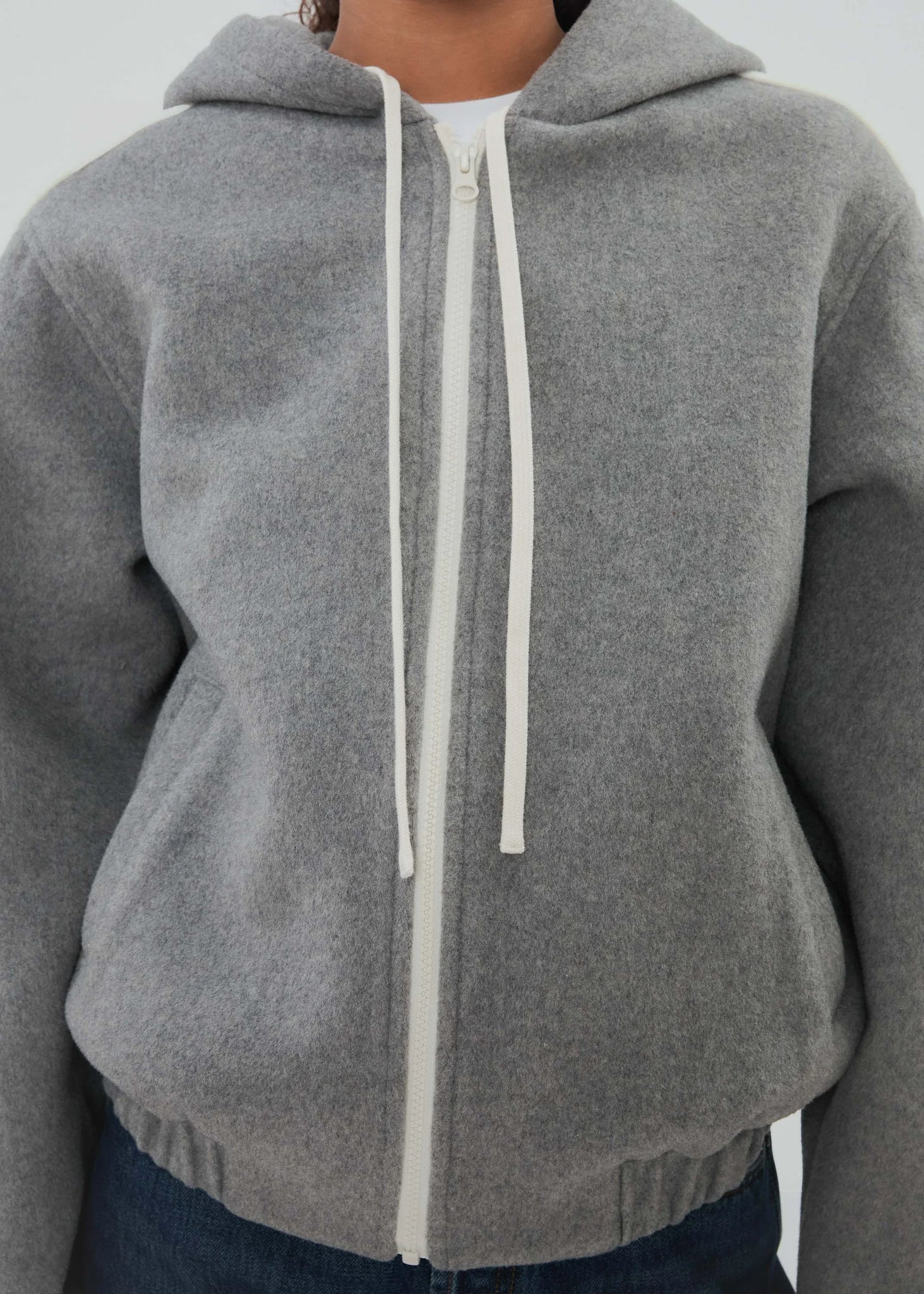 Back view of the Boyfriend Zip in Grey, emphasizing the unique wool texture.