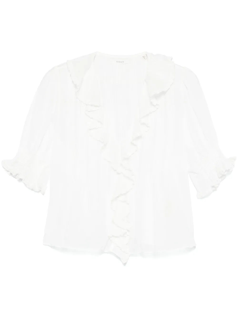 Dôen Henri Top in Salt featuring elegant plunging V-neckline and cascading lace-trimmed ruffles.