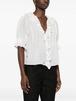The back view of Dôen's Henri Top in Salt showcasing delicate clustered pintucks and short puffed sleeves.