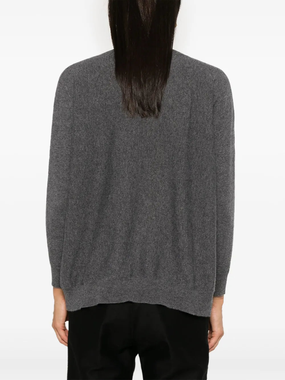 Model wearing the Kenny Sweater in Graphite by Lisa Yang, demonstrating its chic look and comfort.