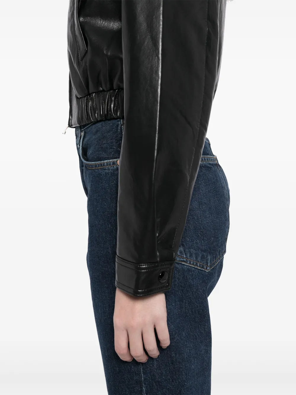 Essie Jacket in Black on a clothing rack - A timeless classic crafted from environmentally friendly materials.