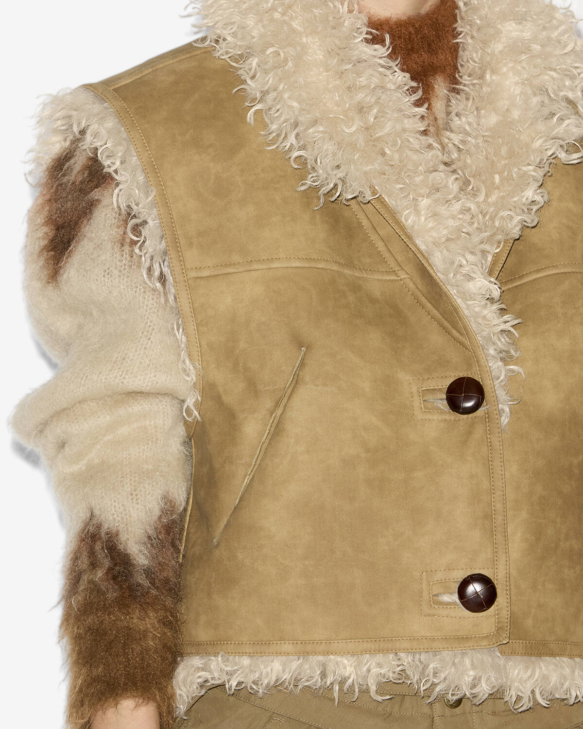 Flat lay of the Clara Vest in Taupe, perfect for layering in stylish outfits.