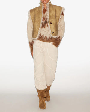 Close-up view of the Clara Vest in Taupe showing buttoned front and side pockets.