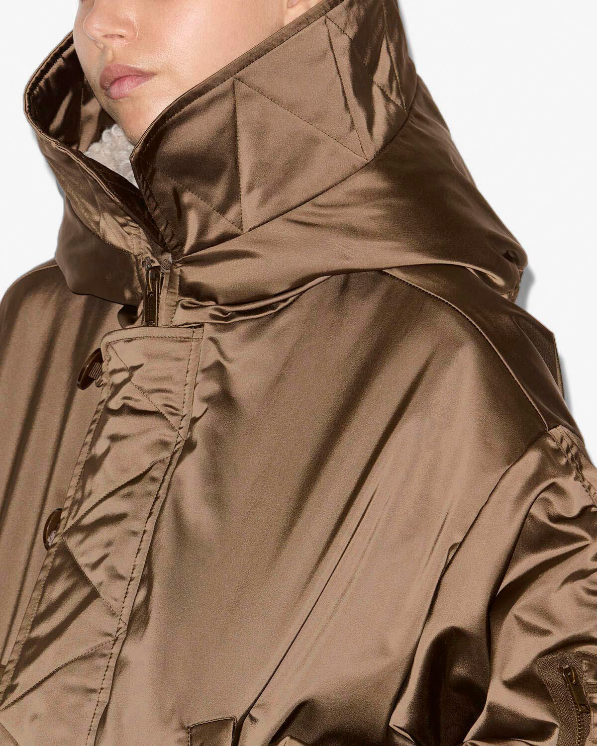Back view of the Elisa Coat in Khaki with a ribbed hem and stylish zippered patch pockets by Isabel Marant.
